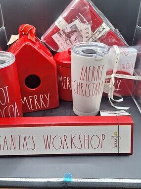 Rea Dunn Christmas Cups, Sign, Napkin Holder, and Piggy Bank are festive.